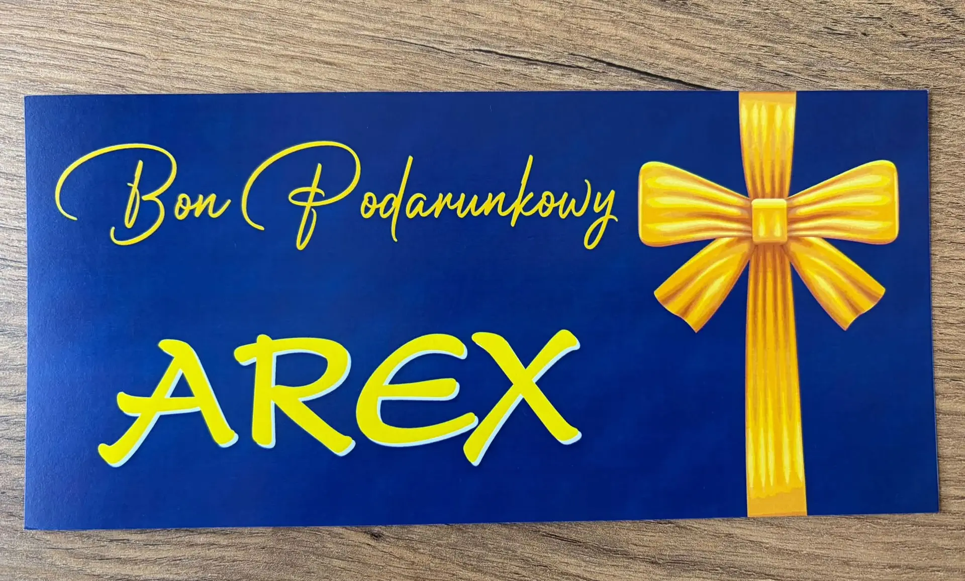 Bon podarunkowy AREX z żółtą kokardą